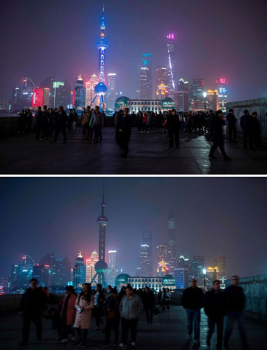 Khu tài chính Lujiazui ở Phố Đông, Thượng Hải, Trung Quốc tắt đèn trong 60 phút của giờ Trái Đất. (Ảnh: AFP)