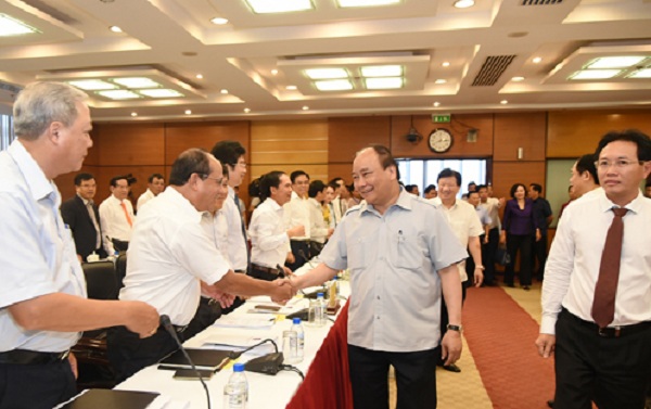 Thủ tướng Nguyễn Xuân Phúc đến làm việc với Tập đoàn Dầu khí Việt Nam. Ảnh: VGP/Quang Hiếu