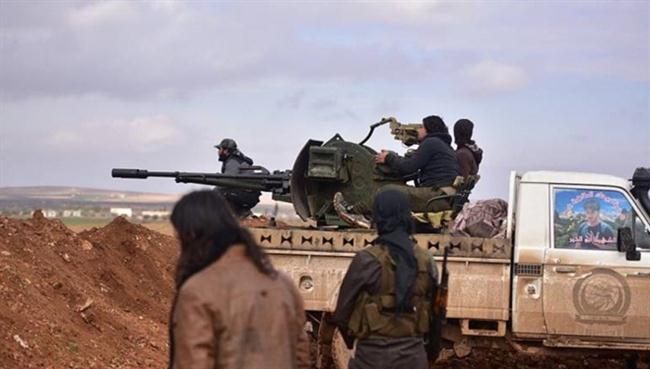 Quân khủng bố sử dụng xe bán tải lắp súng máy để tấn công quân đội Chính phủ Syria. Ảnh: ITN