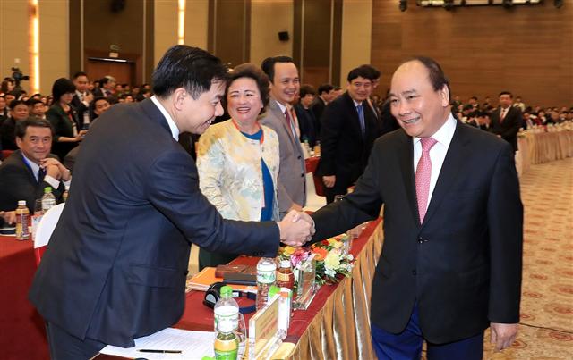 Thủ tướng dự Hội nghị gặp mặt các nhà đầu tư lần thứ 10 của tỉnh Nghệ An. Ảnh: VGP/Quang Hiếu