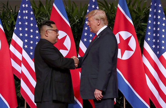 Lãnh đạo Mỹ-Triều trong cuộc gặp thượng đỉnh tại Singapore. Ảnh Reuters.