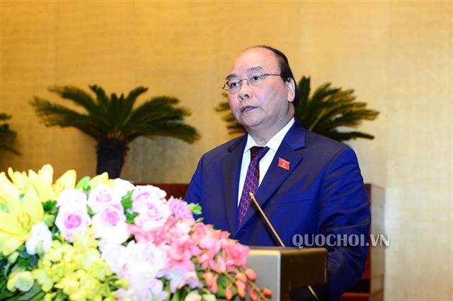 Thủ tướng Chính phủ Nguyễn Xuân Phúc trình bày Báo cáo về tình hình kinh tế - xã hội năm 2018 và kế hoạch phát triển kinh tế - xã hội năm 2019