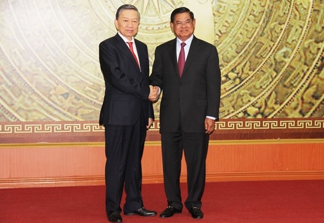 Bộ trưởng Tô Lâm; Ngài Samdech Krolahom Sar Kheng, Phó Thủ tướng, Bộ trưởng Bộ Nội vụ Vương quốc Campuchia.