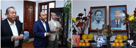 Thủ tướng Nguyễn Xuân Phúc và Phó Thủ tướng Thường trực Trương Hòa Bình dâng hương tưởng nhớ nguyên Thủ tướng Phạm Văn Đồng. Ảnh: TTXVN