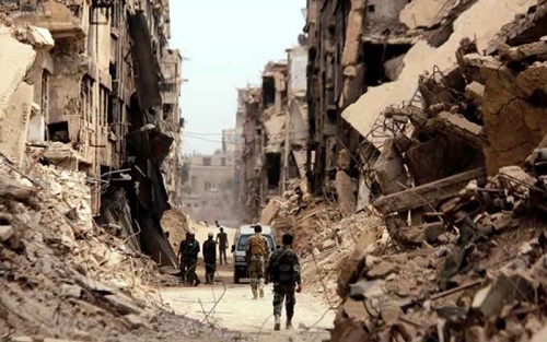 Khung cảnh hoang tàn vì giao tranh ở Syria. Ảnh: Reuters.